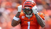 Sep 14, 2025; Cincinnati, Ohio, USA; Cincinnati Bengals wide receiver Ja'Marr Chase (1) celebrates after breaking away for a long run on a reception in the second quarter at Paycor Stadium.