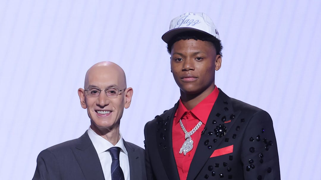 Jun 25, 2025; Brooklyn, NY, USA;  Ace Bailey stands with NBA commissioner Adam Silver after being selected as the fifth pick by the Utah Jazz in the first round of the 2025 NBA Draft at Barclays Center. Mandatory Credit: Brad Penner-Imagn Images
