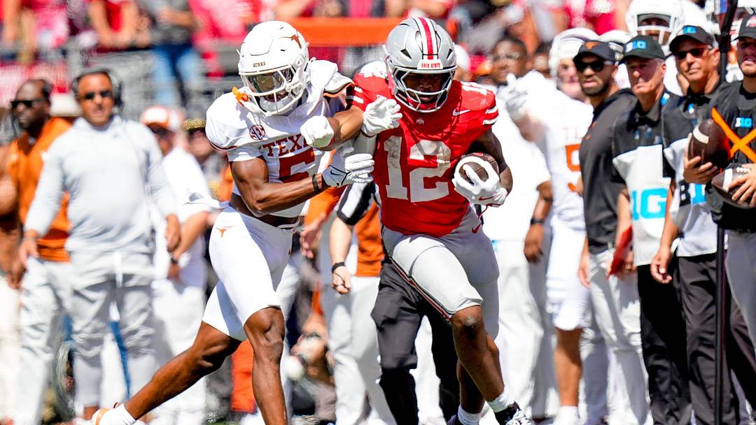 Ohio State Buckeyes running back CJ Donaldson runs the ball against Texas Longhorns defensive back Malik Muhammad in the second half at Ohio Stadium on Saturday, Aug. 30, 2025, in Columbus, Ohio. Ohio State Buckeyes running back CJ Donaldson runs the ball against Texas Longhorns defensive back Malik Muhammad in the second half at Ohio Stadium on Saturday, Aug. 30, 2025, in Columbus, Ohio.