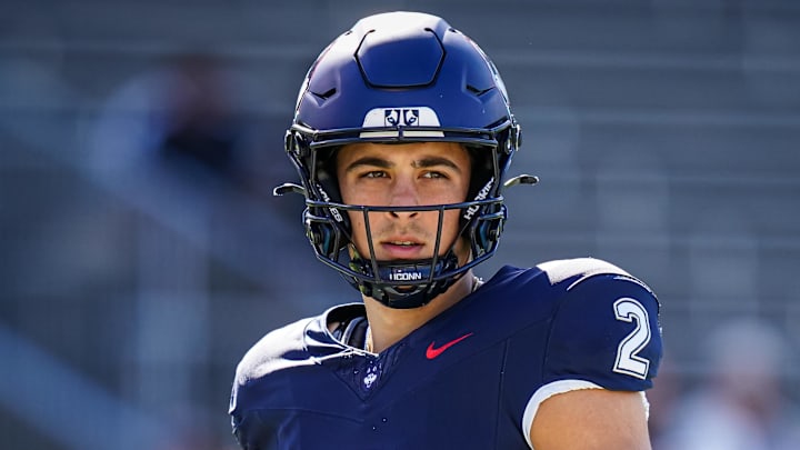 Connecticut Huskies quarterback Joe Fagnano warms up