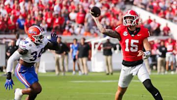 Florida Gators edge George Gumbs Jr. (34) pressures Georgia Bulldogs quarterback Carson Beck (15) during the first half at EverBank Stadium in Jacksonville, FL on Saturday, November 2, 2024. [Doug Engle/Gainesville Sun]