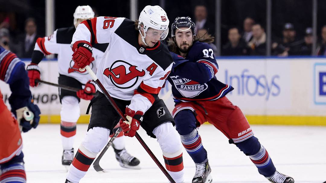 Jan 9, 2025; New York, New York, USA; New Jersey Devils center Jack Hughes (86) plays the puck against New York Rangers center Mika Zibanejad (93) during the first period at Madison Square Garden. Mandatory Credit: Brad Penner-Imagn Images Jan 9, 2025; New York, New York, USA; New Jersey Devils center Jack Hughes (86) plays the puck against New York Rangers center Mika Zibanejad (93) during the first period at Madison Square Garden. Mandatory Credit: Brad Penner-Imagn Images