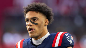 Dec 15, 2024; Glendale, Arizona, USA; New England Patriots cornerback Christian Gonzalez (0) against the Arizona Cardinals at State Farm Stadium. Mandatory Credit: Mark J. Rebilas-Imagn Images