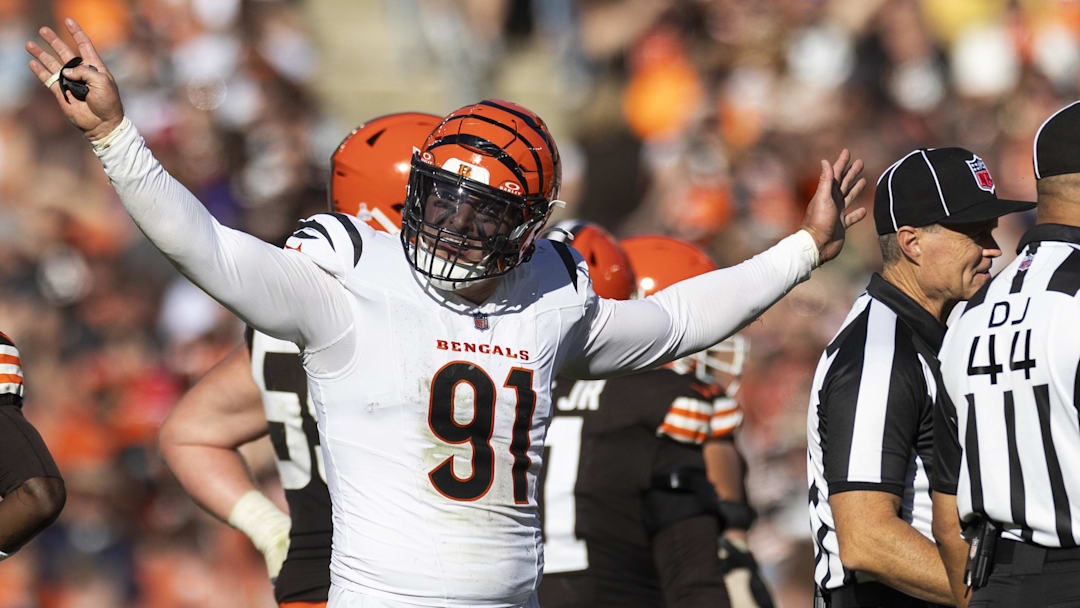 Oct 20, 2024; Cleveland, Ohio, USA; Cincinnati Bengals defensive end Trey Hendrickson (91) reacts following penalty flags being thrown during the fourth quarter against the Cleveland Browns at Huntington Bank Field. The penalties were against the Browns. Mandatory Credit: Scott Galvin-Imagn Images