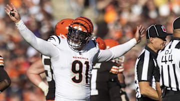 Oct 20, 2024; Cleveland, Ohio, USA; Cincinnati Bengals defensive end Trey Hendrickson (91) reacts following penalty flags being thrown during the fourth quarter against the Cleveland Browns at Huntington Bank Field. The penalties were against the Browns. Mandatory Credit: Scott Galvin-Imagn Images