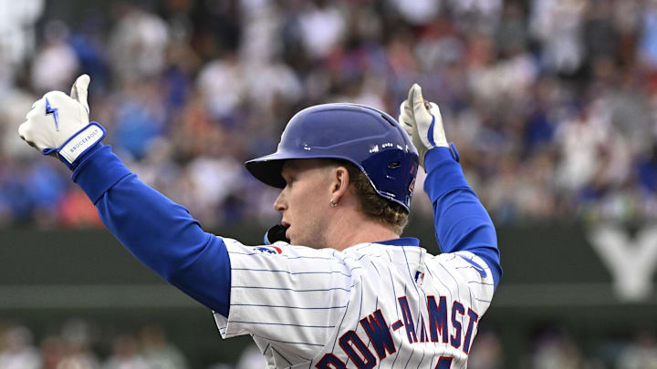 Chicago Cubs outfielder Pete Crow-Armstrong (4) signals a thumbs up after hitting an RBI single against the St. Louis Cardinals during the first inning at Wrigley Field on July 6. Chicago Cubs outfielder Pete Crow-Armstrong (4) signals a thumbs up after hitting an RBI single against the St. Louis Cardinals during the first inning at Wrigley Field on July 6.