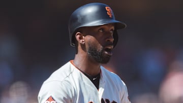 Jun 23, 2018; San Francisco, CA, USA; San Francisco Giants right fielder Andrew McCutchen (22) reacts after being hit by a wild pitch from the San Diego Padres in the seventh inning at AT&T Park