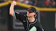 Jun 30, 2025; Phoenix, Arizona, USA;  Arizona Diamondbacks pitcher Shelby Miller (18) throws in the ninth inning against the San Francisco Giants at Chase Field. Mandatory Credit: Matt Kartozian-Imagn Images