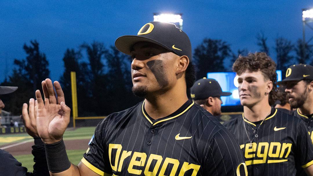 Oregon’s Naulivou Lauaki Jr., center, celebrates with teammates after the Ducks defeated Yale to advance in the NCAA Eugene Regional Baseball Tournament game at PK Park n Eugene May 29, 2026.