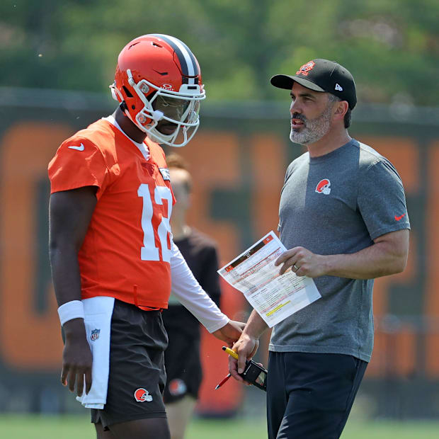 Cleveland Browns quarterback Shedeur Sanders (12) speaks with head coach Kevin Stefanski during practice at NFL minicamp, Wed
