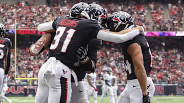 Sep 28, 2025; Houston, Texas, USA; Houston Texans wide receiver Jayden Higgins (81) celebrates with teammates after scoring a touchdown during the fourth quarter against the Tennessee Titans at NRG Stadium. Mandatory Credit: Troy Taormina-Imagn Images