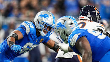 The Detroit Lions get after Chicago Bears quarterback Caleb Williams.