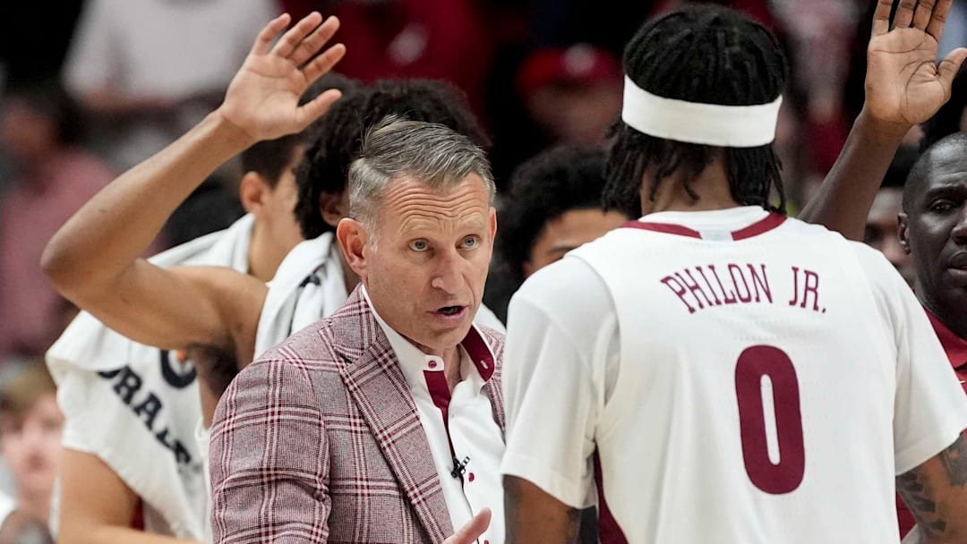 Nov 13, 2025; Tuscaloosa, Alabama, USA; Alabama head coach Nate Oats talks to Alabama guard Labaron Philon Jr. (0) during a timeout at Coleman Coliseum. Purdue defeated Alabama 87-80. Mandatory Credit: Gary Cosby Jr.-Tuscaloosa News