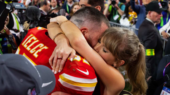 Feb 11, 2024; Paradise, Nevada, USA; Kansas City Chiefs tight end Travis Kelce (87) celebrates with girlfriend Taylor Swift after defeating the San Francisco 49ers in Super Bowl LVIII at Allegiant Stadium. 