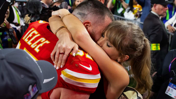 Feb 11, 2024; Paradise, Nevada, USA; Kansas City Chiefs tight end Travis Kelce (87) celebrates with girlfriend Taylor Swift after defeating the San Francisco 49ers in Super Bowl LVIII at Allegiant Stadium. 