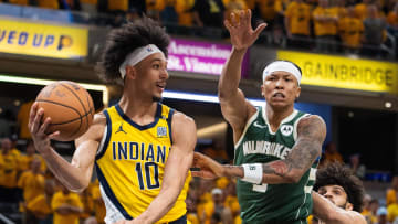 May 2, 2024; Indianapolis, Indiana, USA; Indiana Pacers guard Kendall Brown (10) passes the ball while Milwaukee Bucks forward MarJon Beauchamp (3) defends during game six of the first round for the 2024 NBA playoffs at Gainbridge Fieldhouse. Mandatory Credit: Trevor Ruszkowski-USA TODAY Sports