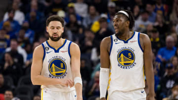 Jan 22, 2023; San Francisco, California, USA; Golden State Warriors guard Klay Thompson (11) and center Kevon Looney (5) on the court during the first half of the game against the Brooklyn Nets at Chase Center. Mandatory Credit: John Hefti-USA TODAY Sports