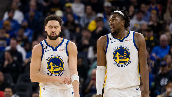 Jan 22, 2023; San Francisco, California, USA; Golden State Warriors guard Klay Thompson (11) and center Kevon Looney (5) on the court during the first half of the game against the Brooklyn Nets at Chase Center. Mandatory Credit: John Hefti-USA TODAY Sports