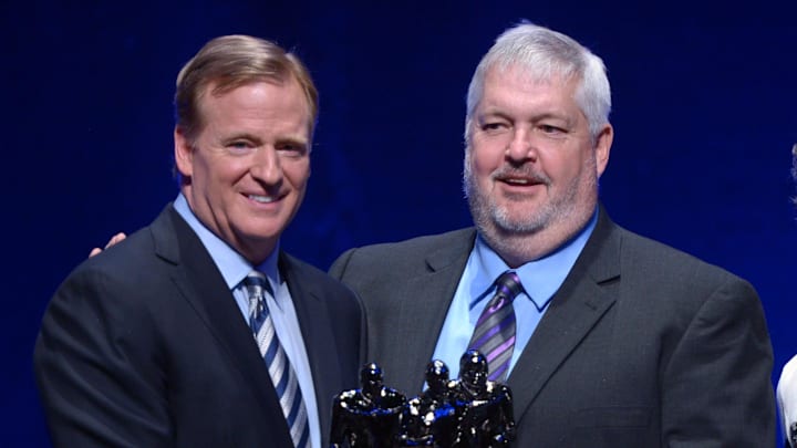 Jan 31, 2014; New York, NY, USA; NFL commissioner Roger Goodell poses for a photo with Eden Prairie High School head coach Mike Grant who was named the Don Shula NFL High School Coach of the Year after a press conference at Rose Theater. Mandatory Credit: Kirby Lee-Imagn Images