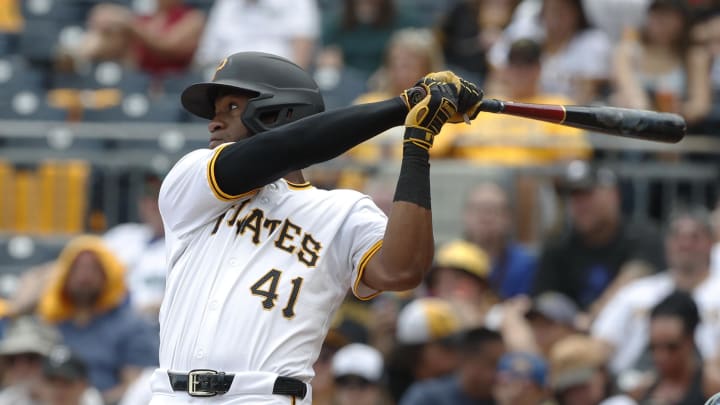 Pittsburgh Pirates left fielder Bryan De La Cruz (41) hits an RBI single against the Seattle Mariners during the sixth inning at PNC Park. 