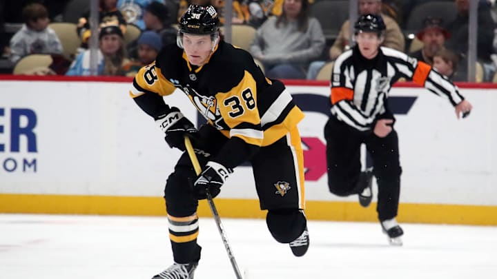 Jan 11, 2025; Pittsburgh, Pennsylvania, USA; Pittsburgh Penguins defenseman Owen Pickering (38) skates up ice with the puck against the Ottawa Senators during the third period at PPG Paints Arena. Mandatory Credit: Charles LeClaire-Imagn Images Jan 11, 2025; Pittsburgh, Pennsylvania, USA; Pittsburgh Penguins defenseman Owen Pickering (38) skates up ice with the puck against the Ottawa Senators during the third period at PPG Paints Arena. Mandatory Credit: Charles LeClaire-Imagn Images