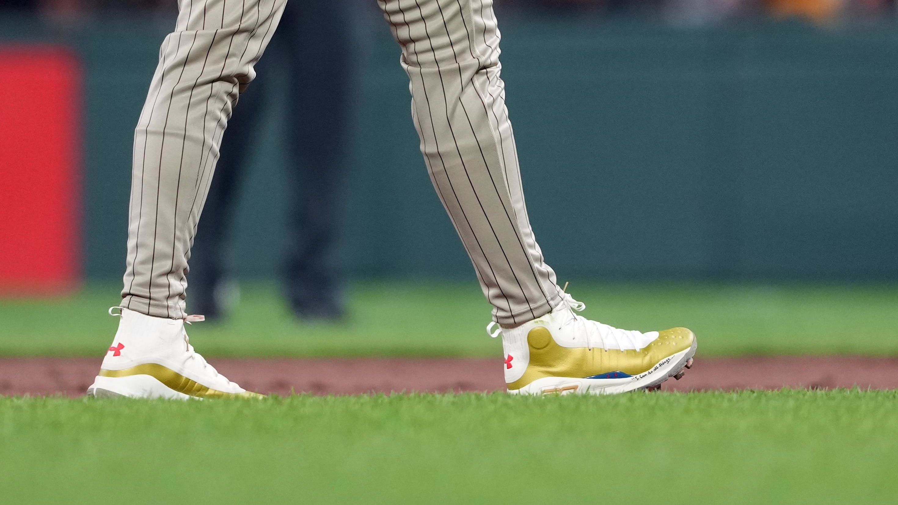 San Diego Padres right fielder Fernando Tatis Jr.'s white and gold Under Armour cleats.
