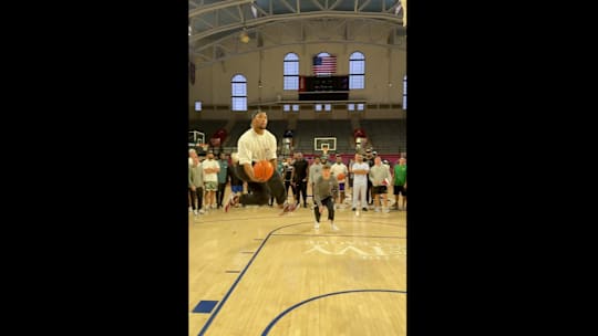 Saquon Barkley and Cooper DeJean going for an alley-oop during an Eagles outing on May 23, 2025.