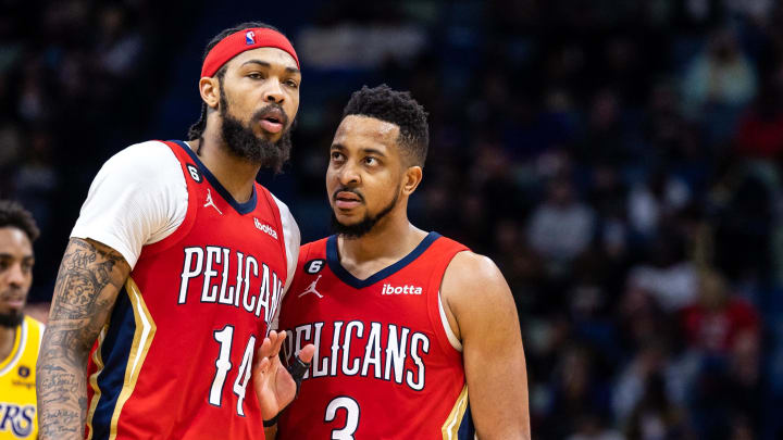 Mar 14, 2023; New Orleans, Louisiana, USA; New Orleans Pelicans guard CJ McCollum (3) talks to forward Brandon Ingram (14) against the Los Angeles Lakers during the second half at Smoothie King Center. Mandatory Credit: Stephen Lew-USA TODAY Sports