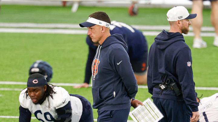 May 8, 2026; Lake Forest, IL, USA; Chicago Bears defensive coordinator Dennis Allen walks on the field during Rookie Minicamp at Halas Hall. Mandatory Credit: Kamil Krzaczynski-Imagn Images