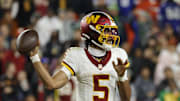Nov 2, 2025; Landover, Maryland, USA; Washington Commanders quarterback Jayden Daniels (5) passes the ball during the second half against the Seattle Seahawks at Northwest Stadium. Mandatory Credit: Amber Searls-Imagn Images