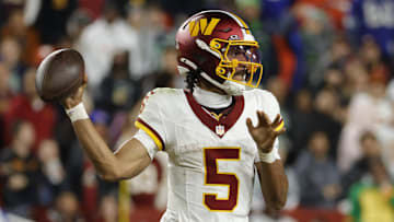 Nov 2, 2025; Landover, Maryland, USA; Washington Commanders quarterback Jayden Daniels (5) passes the ball during the second half against the Seattle Seahawks at Northwest Stadium. 