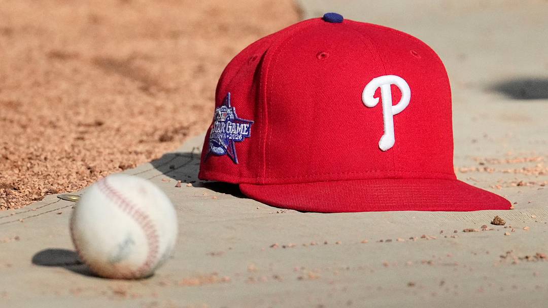 Jun 12, 2026; Milwaukee, Wisconsin, USA; Philadelphia Phillies hat on the field during batting practice before a game against the Milwaukee Brewers at American Family Field. Mandatory Credit: Michael McLoone-Imagn Images