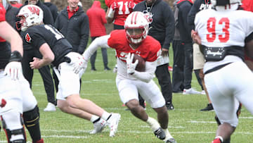 Wisconsin running back Nate White carries the ball during the team's 10th spring practice, which was held on a practice field north of Camp Randall Stadium in Madison, Wisconsin on Saturday April 20, 2024.