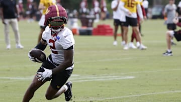 Jul 26, 2024; Ashburn, VA, USA; Washington Commanders wide receiver Dyami Brown (2) carries the ball after catching a pass on day three of training camp at Commanders Park. Mandatory Credit: Geoff Burke-Imagn Images