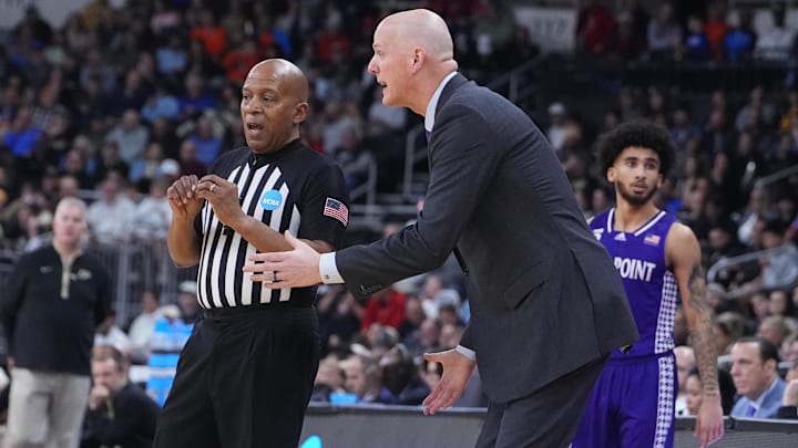 Mar 20, 2025; Providence, RI, USA; High Point Panthers head coach Alan Huss speaks with an official during the first half against the Purdue Boilermakers at Amica Mutual Pavilion. Mandatory Credit: Gregory Fisher-Imagn Images