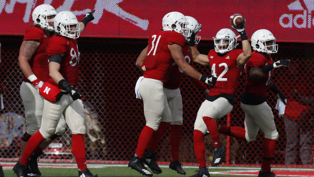 Nebraska Cornhuskers safety Jeremiah Stovall (42) celebrates after recovering a fumble against the Illinois Fighting Illini.