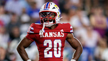 Aug 29, 2025; Lawrence, Kansas, USA; Kansas Jayhawks running back Johnny Thompson Jr. (20) on the field during the second half against the Wagner Seahawks at David Booth Kansas Memorial Stadium. Mandatory Credit: William Purnell-Imagn Images