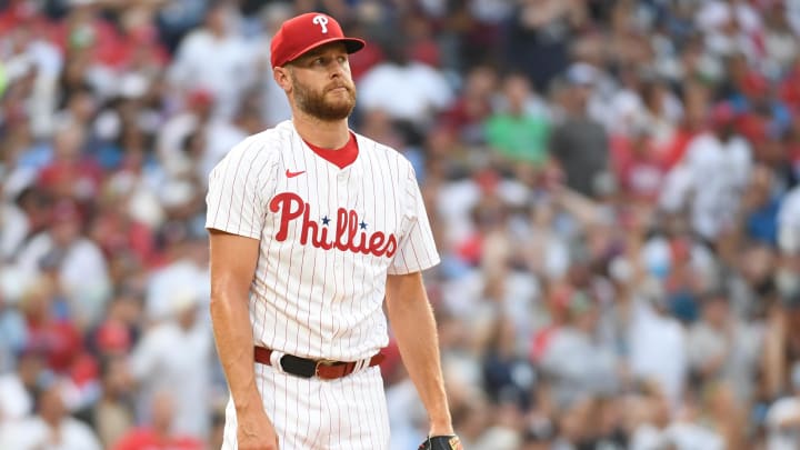 Jul 29, 2024; Philadelphia, Pennsylvania, USA; Philadelphia Phillies pitcher Zack Wheeler (45) reacts after allowing a home run against the New York Yankees during the second inning at Citizens Bank Park. Mandatory Credit: Eric Hartline-USA TODAY Sports