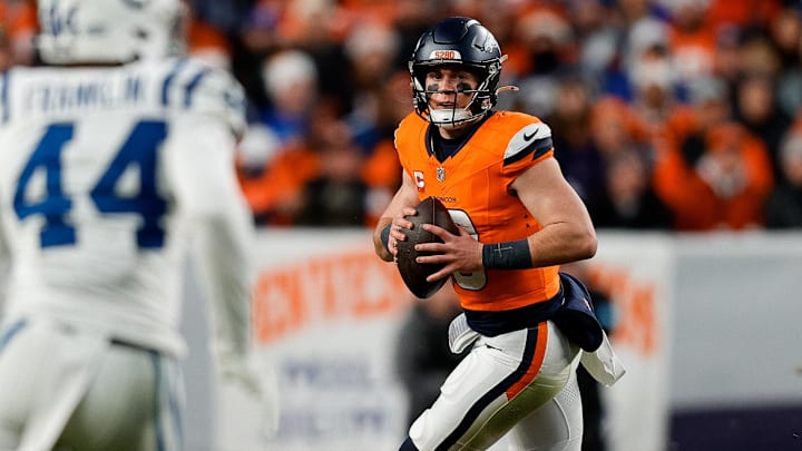 Dec 15, 2024; Denver, Colorado, USA; Denver Broncos quarterback Bo Nix (10) scrambles as Indianapolis Colts linebacker Zaire Franklin (44) defends in the third quarter at Empower Field at Mile High. Dec 15, 2024; Denver, Colorado, USA; Denver Broncos quarterback Bo Nix (10) scrambles as Indianapolis Colts linebacker Zaire Franklin (44) defends in the third quarter at Empower Field at Mile High.