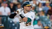 Jun 20, 2025; West Sacramento, California, USA; Athletics catcher Austin Wynns (29) bats during the game against the Cleveland Guardians at Sutter Health Park. Mandatory Credit: Sergio Estrada-Imagn Images