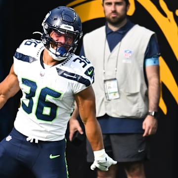 Aug 10, 2024; Inglewood, California, USA; Seattle Seahawks running back George Holani (36) makes a touchdown against the Los Angeles Chargers during the second quarter at SoFi Stadium. Mandatory Credit: Jonathan Hui-Imagn Images