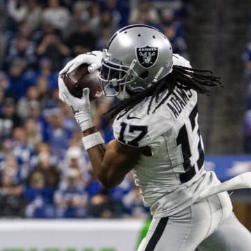 Dec 31, 2023; Indianapolis, Indiana, USA; Las Vegas Raiders wide receiver Davante Adams (17) catches a ball in the second half against the Indianapolis Colts at Lucas Oil Stadium. Mandatory Credit: Trevor Ruszkowski-USA TODAY Sports