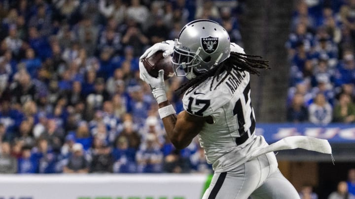 Dec 31, 2023; Indianapolis, Indiana, USA; Las Vegas Raiders wide receiver Davante Adams (17) catches a ball in the second half against the Indianapolis Colts at Lucas Oil Stadium. Mandatory Credit: Trevor Ruszkowski-USA TODAY Sports