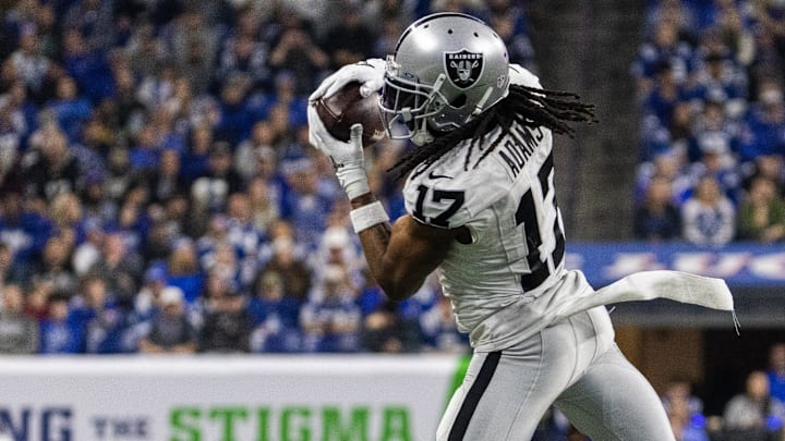 Dec 31, 2023; Indianapolis, Indiana, USA; Las Vegas Raiders wide receiver Davante Adams (17) catches a ball in the second half against the Indianapolis Colts at Lucas Oil Stadium. Dec 31, 2023; Indianapolis, Indiana, USA; Las Vegas Raiders wide receiver Davante Adams (17) catches a ball in the second half against the Indianapolis Colts at Lucas Oil Stadium.