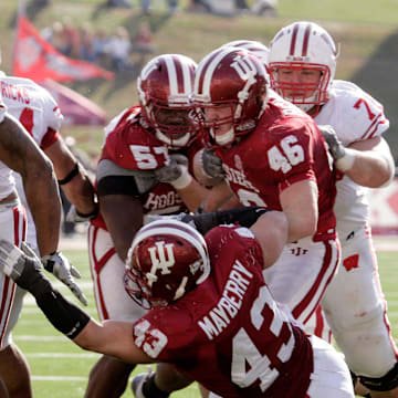 10: John Clay played from 2008 through 2010, rushing for 3,413 yards. Clay is shown breaking through the Indiana defense on a 14-yard touchdown run during the second quarter of their game on November 7, 2009, at Memorial Stadium in Bloomington, Indiana. Wisconsin won 31-28.