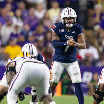 Sep 28, 2024; Baton Rouge, Louisiana, USA;  South Alabama Jaguars quarterback Gio Lopez (7) waits for the snap against the LSU Tigers during the first quarter at Tiger Stadium. 