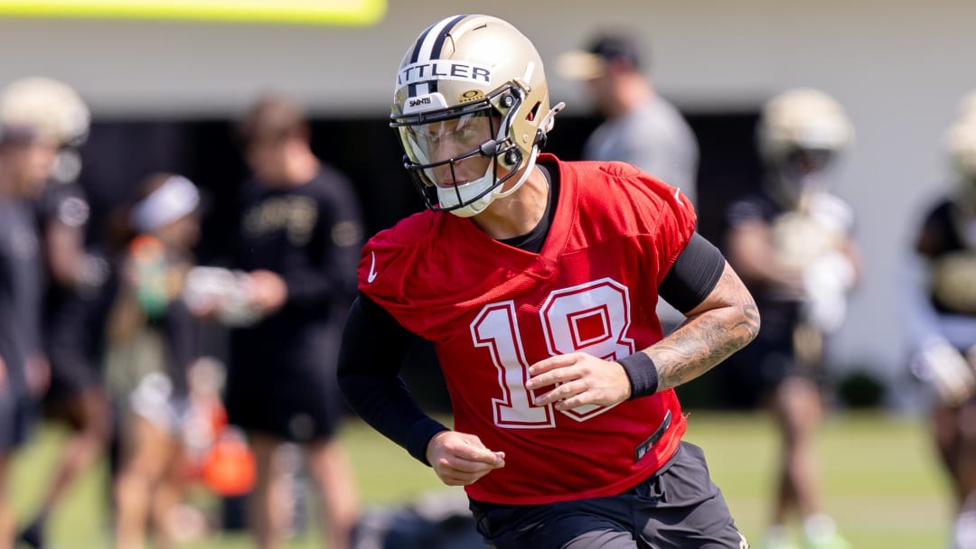 May 11, 2024; New Orleans, LA, USA;  New Orleans Saints quarterback Spencer Rattler (18) runs passing drills during the rookie minicamp at the Ochsner Sports Performance Center. Mandatory Credit: Stephen Lew-USA TODAY Sports