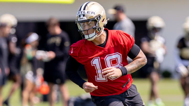 May 11, 2024; New Orleans, LA, USA;  New Orleans Saints quarterback Spencer Rattler (18) runs passing drills during the rookie minicamp at the Ochsner Sports Performance Center. Mandatory Credit: Stephen Lew-USA TODAY Sports