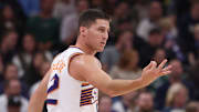 Oct 27, 2025; Salt Lake City, Utah, USA; Phoenix Suns guard Collin Gillespie (12) reacts to a shot against the Utah Jazz during the second half at Delta Center. Mandatory Credit: Rob Gray-Imagn Images