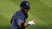 Tampa Bay Rays first baseman Yandy Diaz (2) celebrates while rounding the bases after hitting a home run during the fourth inning against the Baltimore Orioles at Oriole Park at Camden Yards. 
